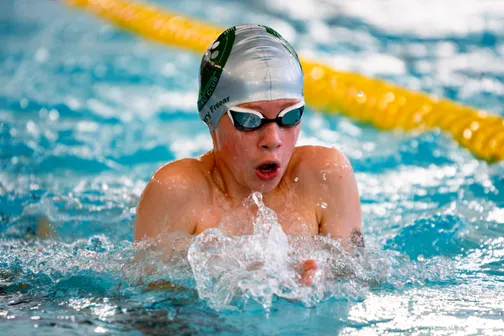 Competitive swimming race in progress